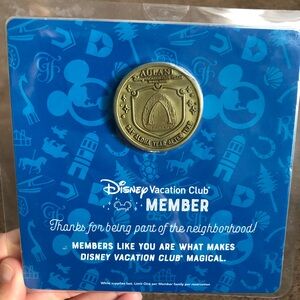 Disney vacation club  Gold Aulani Commemorative Coin on Blue Card